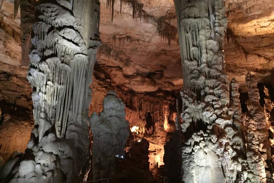 A cave with stalactites and stalagmites.