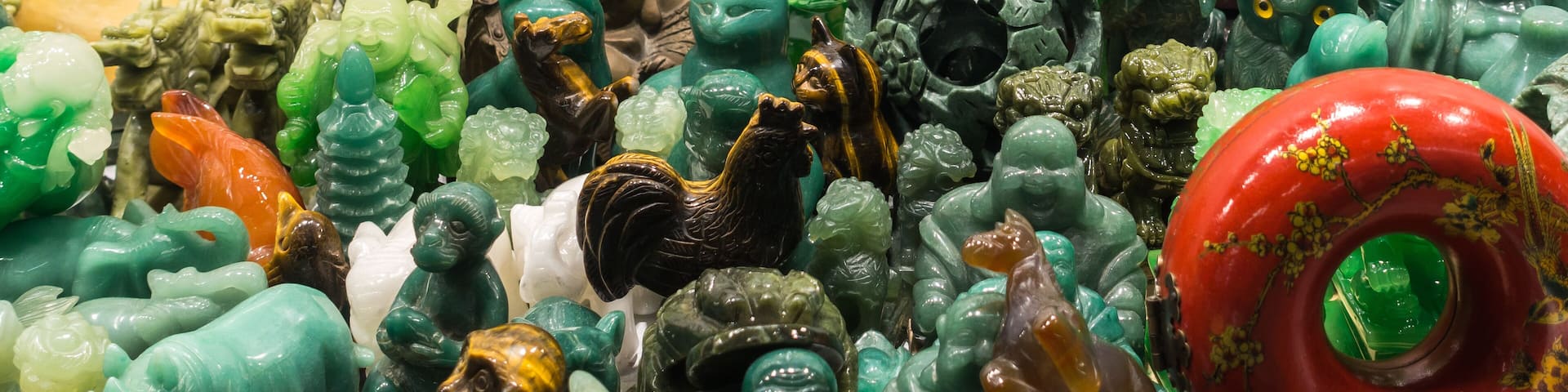 Close-up of Jade statues and souvenirs at the Jade Market, Hong Kong, Kowloon, Yau Ma Tei, Shutterstock ID 1236708733, Purchase Order: SP-1880, Order Number: SP-1880 Hcom Go Guides, Client/Licensee: H