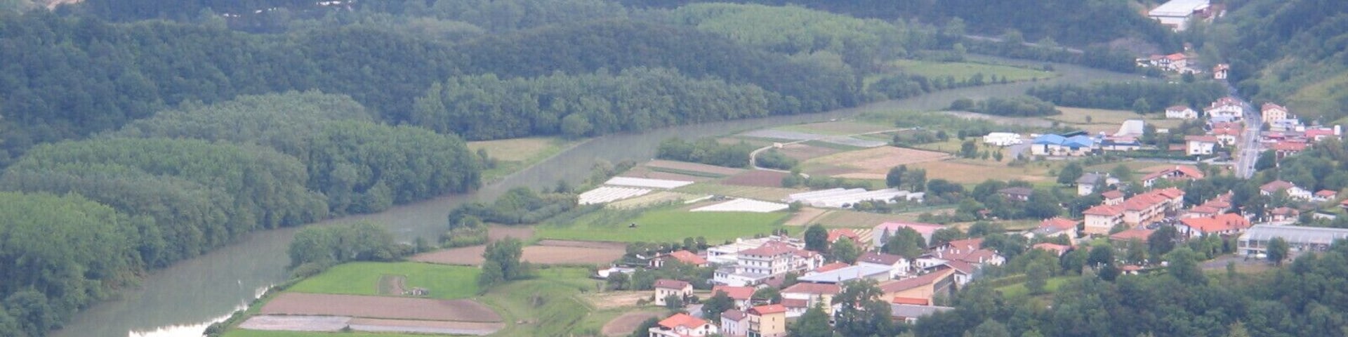View of the Oria estuary meanders and the village Aginaga in Usurbil