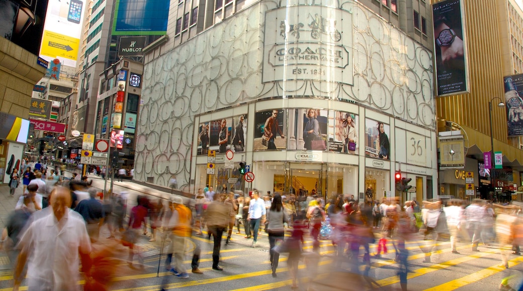 Lan Kwai Fong showing a city, signage and modern architecture