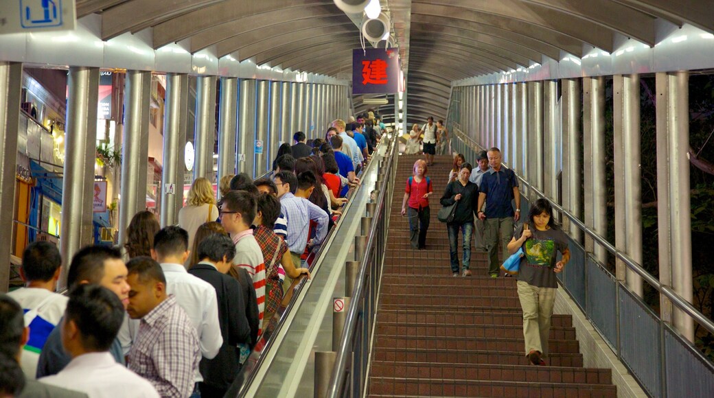 Soho which includes interior views as well as a large group of people