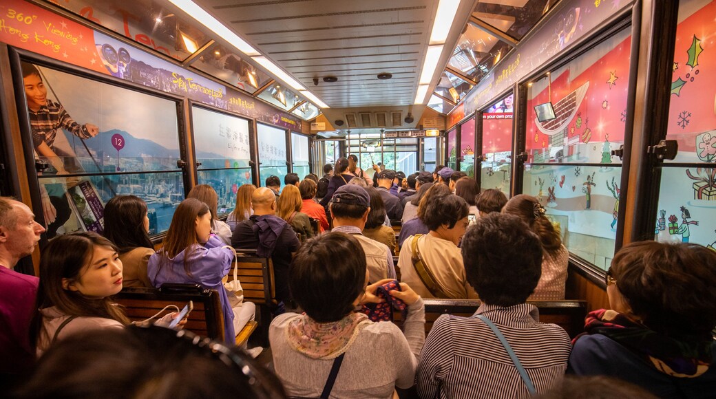 The Peak Tram which includes interior views and railway items as well as a large group of people