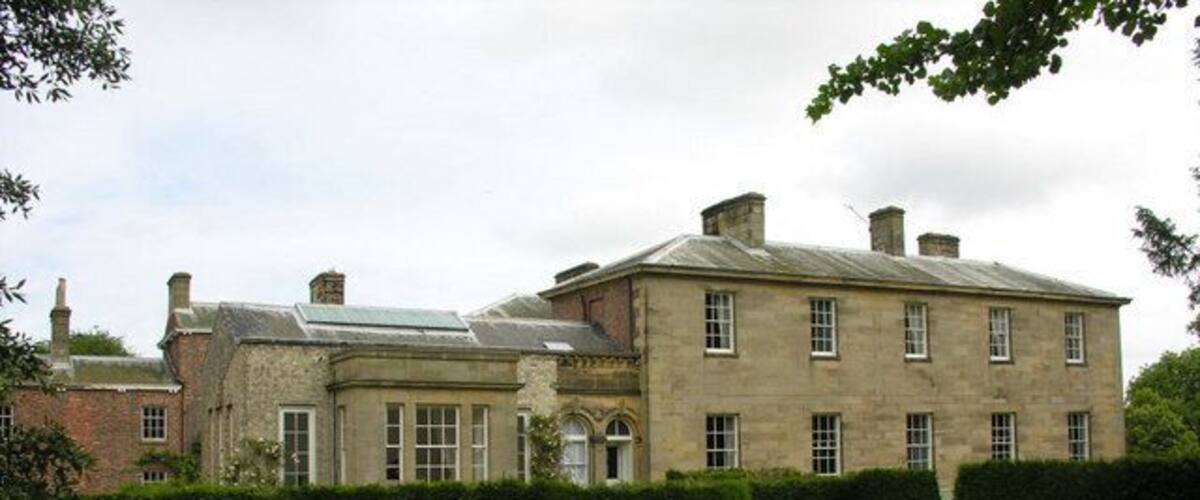 Saltmarshe Hall, Saltmarshe, East Riding of Yorkshire, England. The southern aspect of the Hall, viewed from the riverside footpath.
