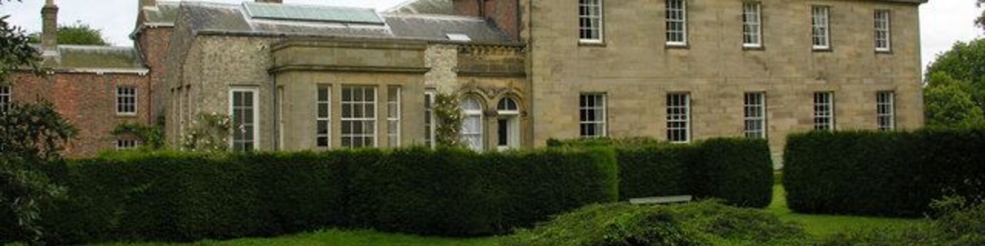 Saltmarshe Hall, Saltmarshe, East Riding of Yorkshire, England. The southern aspect of the Hall, viewed from the riverside footpath.