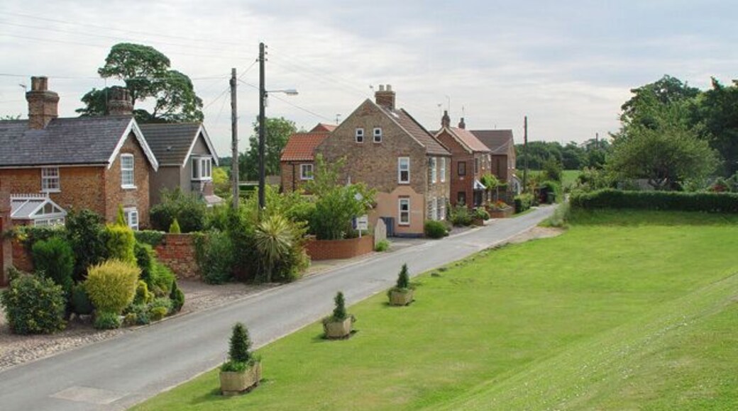 Mill Lane, Saltmarshe, East Riding of Yorkshire, England. The photograph was taken looking east from the flood bank of the Ouse, which is still tidal at this point. This is the eastern end of the village.