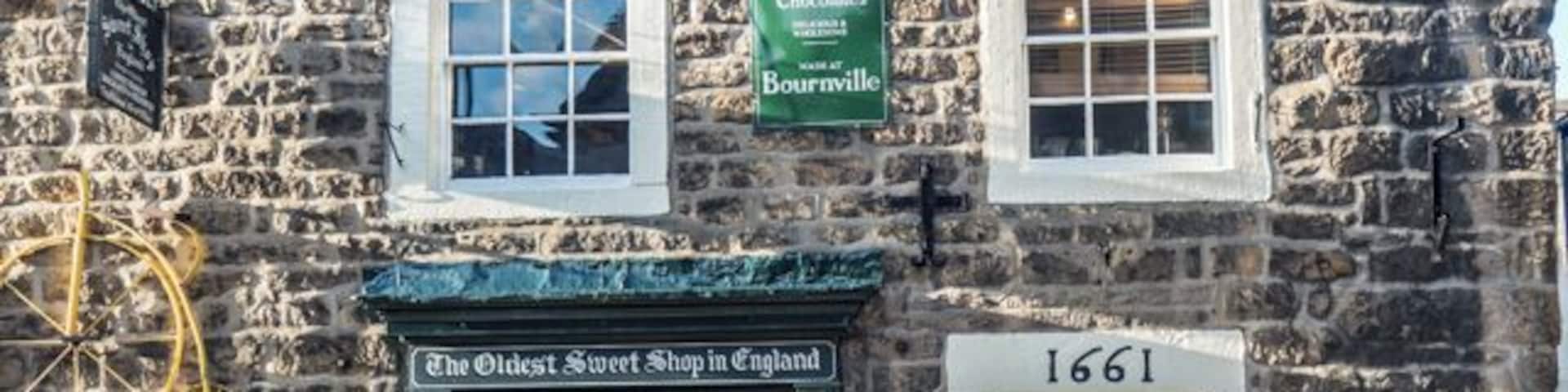 Located in Pately Bridge, Yorkshire Dales, sweets have been sold here continuously since 1827. It is officially the oldest sweet shop in the world.
The interior of the shop, full of boiled sweets, chocolates, snakes etc made to original recipes, is almost the same as it was a century ago.