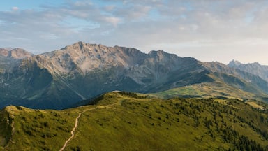 A mountain range with a winding path.