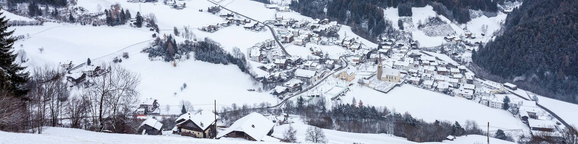 top view on snowy village luesen valley south tirol Italy