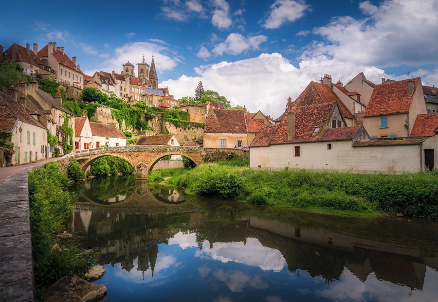 Semur-en-Auxois is a pictures village in the CÎte-d'Or department in eastern France. Here is the iconic view with the bridge over the River Armançon and the historic center at the back.