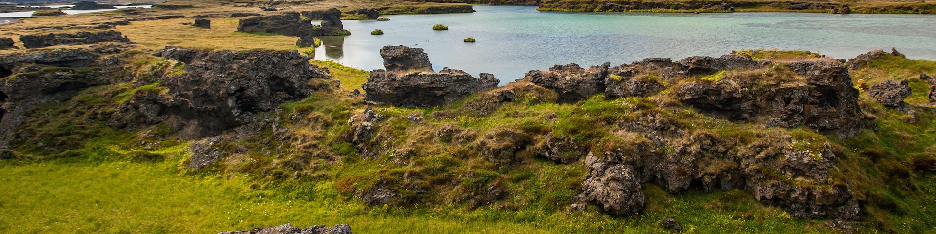 Lake Mývatn is a lake in the northeast of Iceland. There is blue-hued water, which is characterised by high clarity.