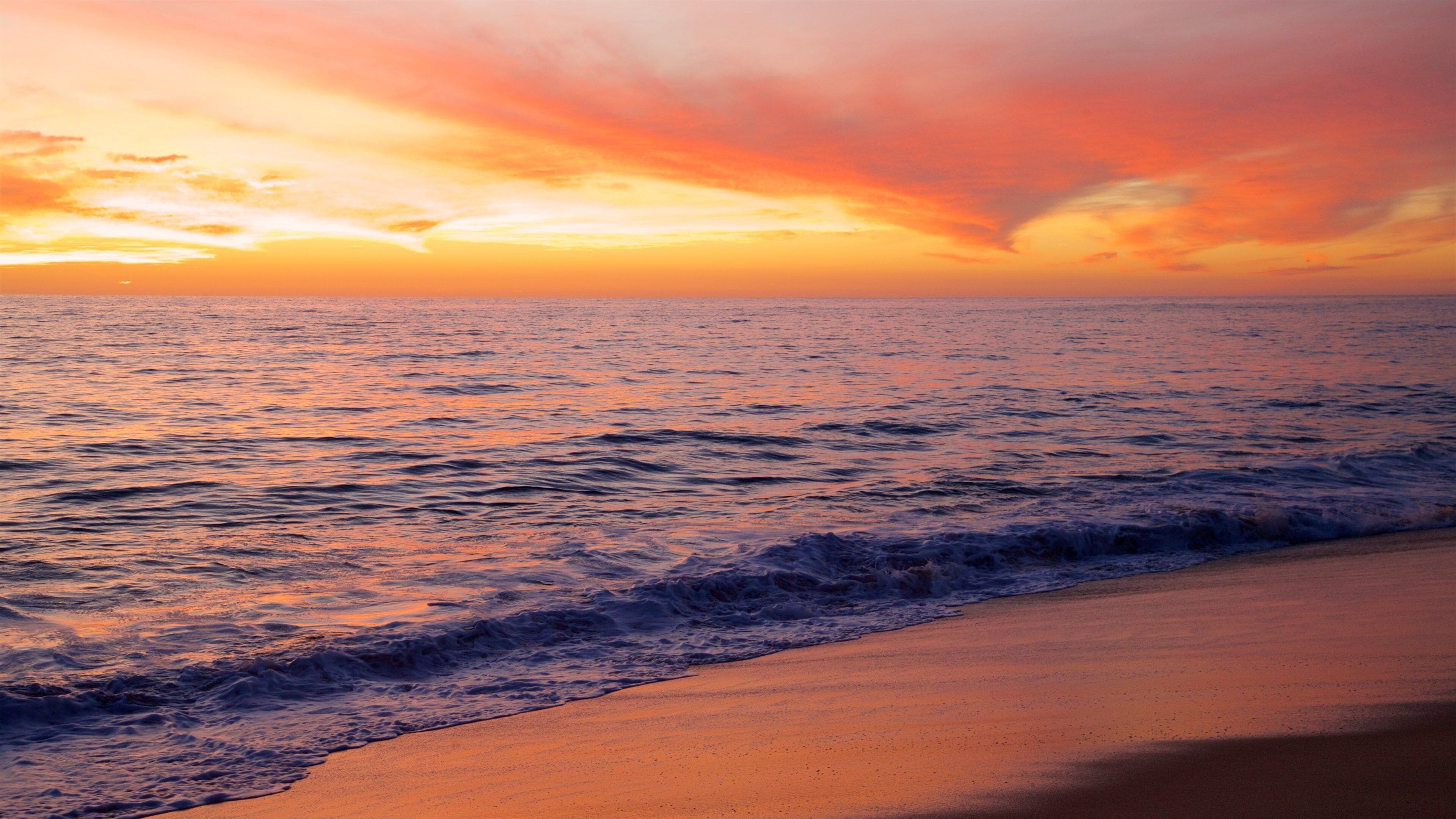 Todos Santos which includes a beach, general coastal views and a sunset