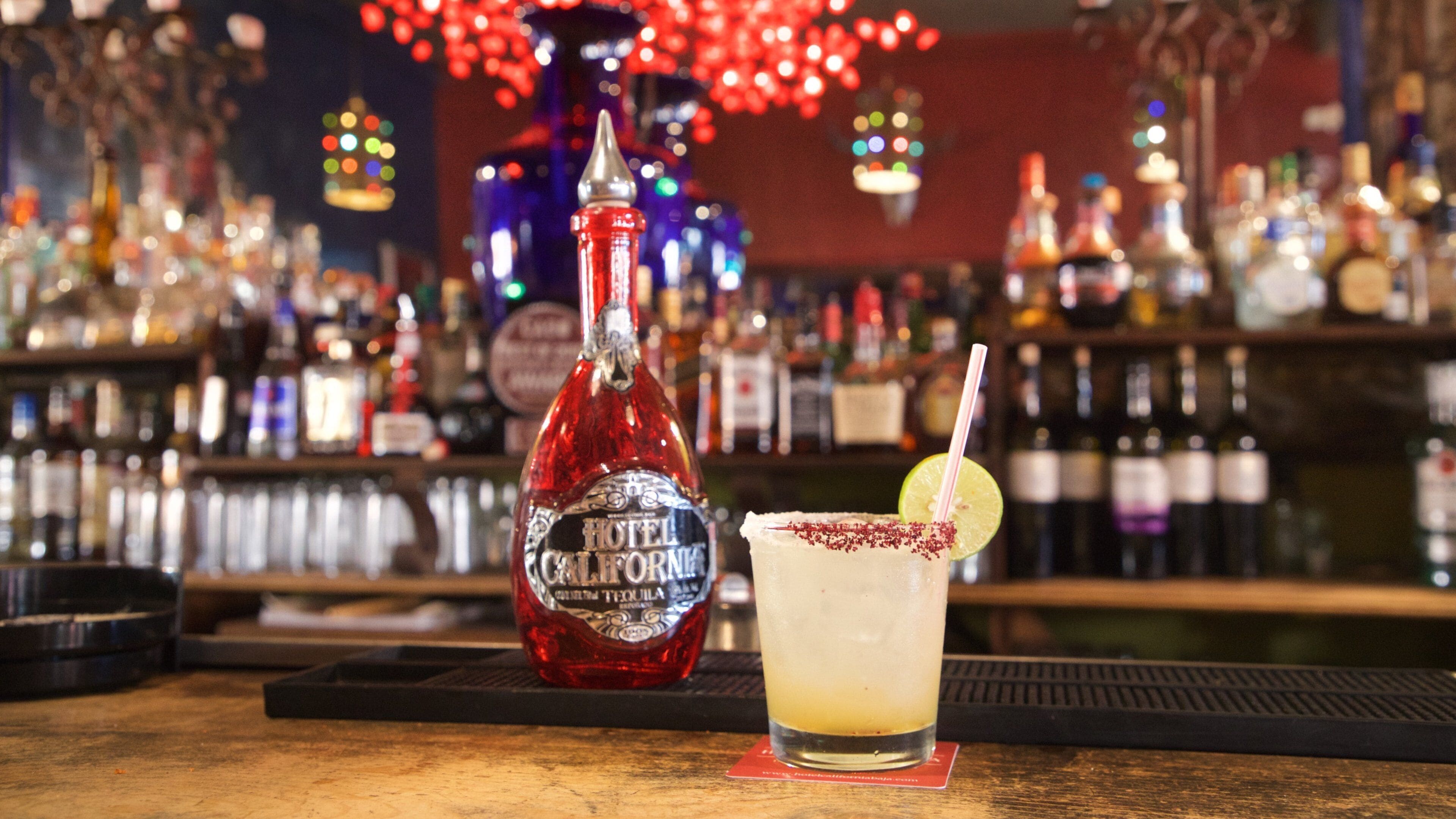 Todos Santos which includes drinks or beverages, a bar and interior views