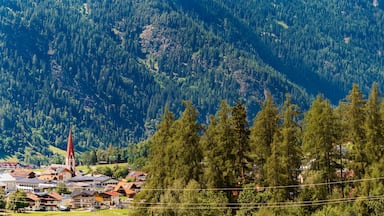 Alpine summer view with a church at Umhausen, Imst, Oetztal valley, Tyrol, Austria