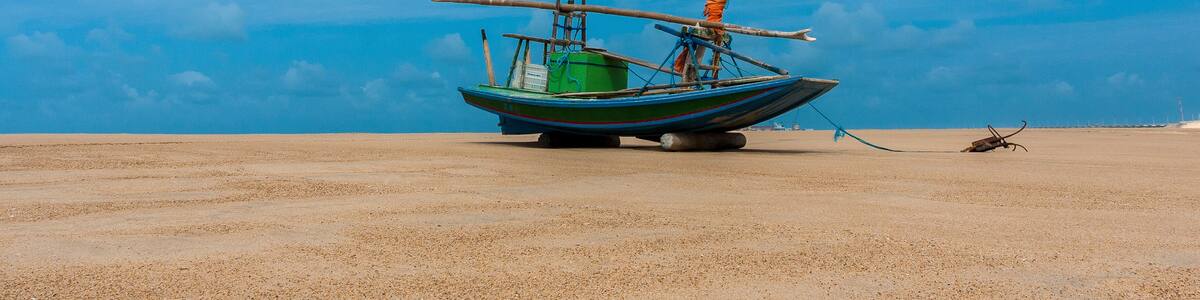 RAFT ANCHORED ON TAIBA BEACH WEST COAST OF THE STATE OF CEARÁ, NORTHEASTERN BRAZIL.