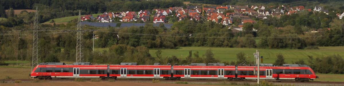 Henfenfeld, Bavaria, Germany September 29 2024 - S-Bahn between Hersbruck and Henfenfeld Train in Landscape Countryside with Village