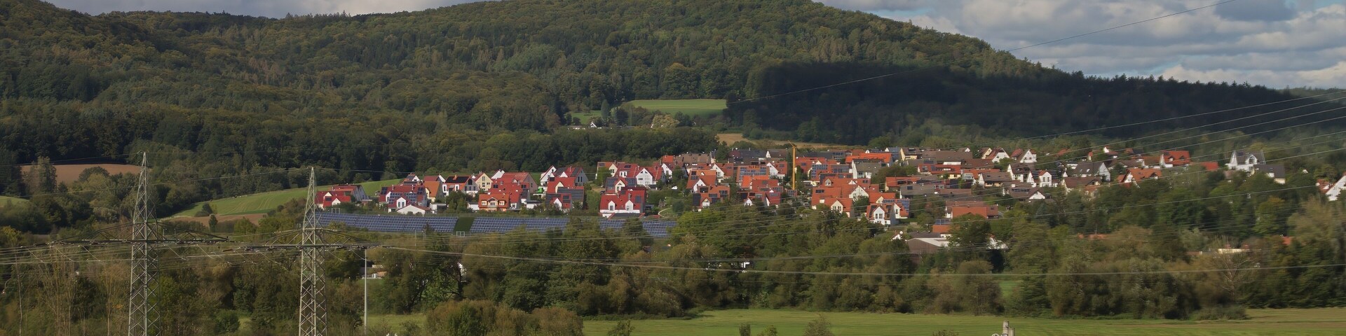Henfenfeld, Bavaria, Germany September 29 2024 - S-Bahn between Hersbruck and Henfenfeld Train in Landscape Countryside with Village