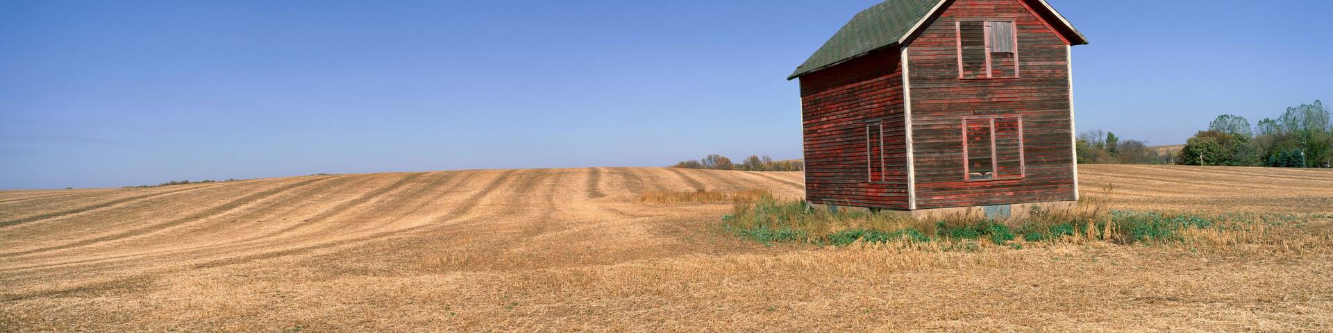 Panoramic view of old farm building in rural Battle Lake, Minnesota