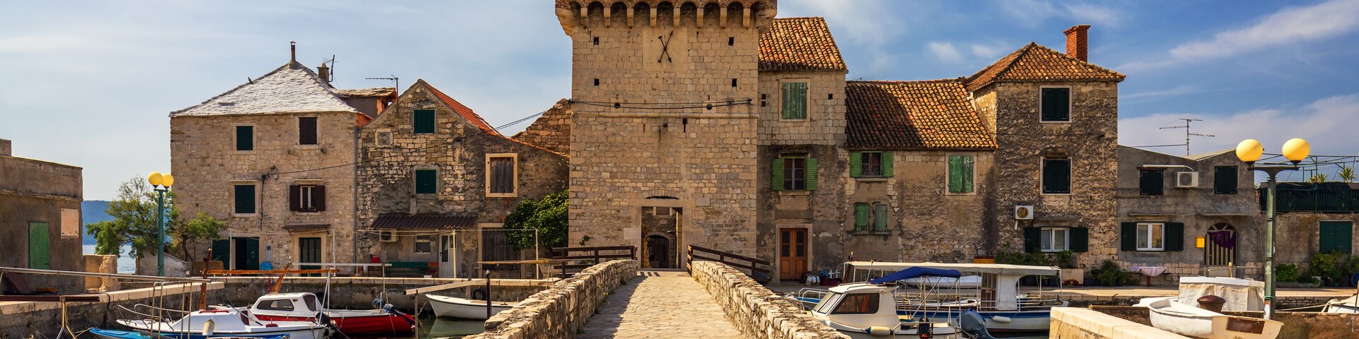 Kastel Gomilica one of seven settlement of town Kastela in Croatia was one of the locations in series Game of Thrones. Historic Kastel Gomilica architecture view near Split, Croatia.