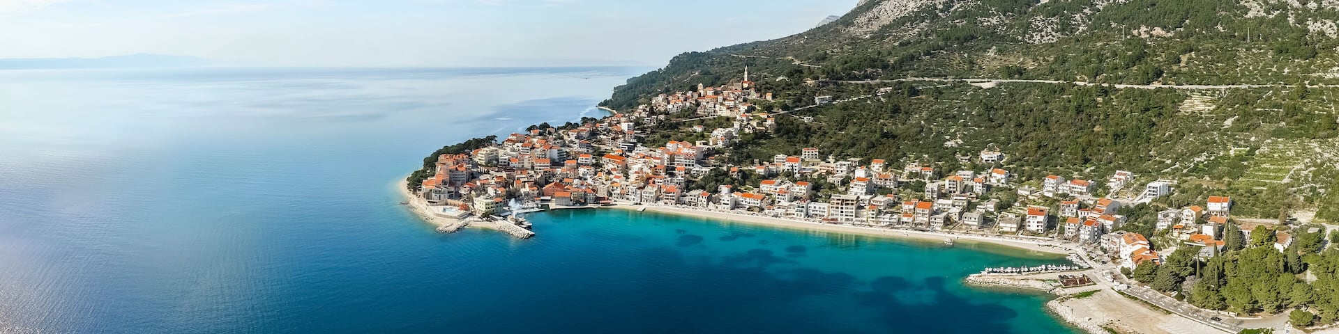 Aerial panoramic view of Igrane town, Dalmatia region, Makarska riviera, Croatia. Beautiful mountain landscape