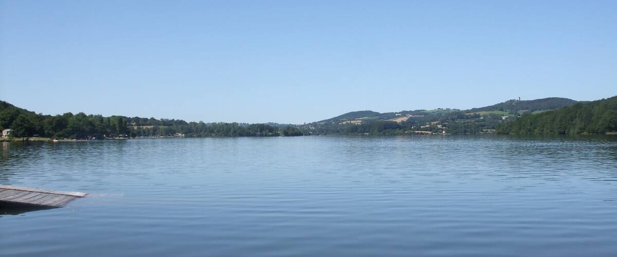 The Lac de Villefranche-de-Panat at Villefranche de Panat, Aveyron, France was created between 1949 and 1952 when the Alrance (river) was dammed as part of a large scheme to divert the waters of the Violou and Alrance to the Le Pouget (power station). The Lac de Pareloup discharges through this lake. The lake is also used for leisure.