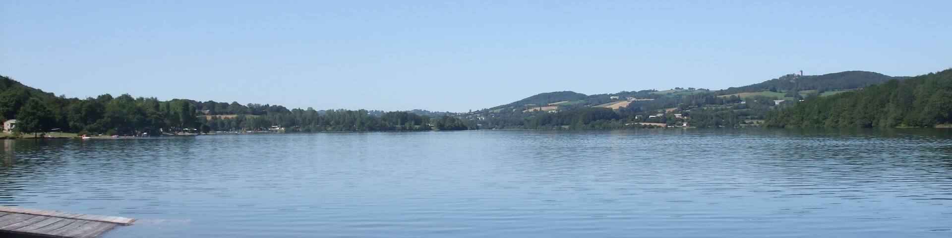 The Lac de Villefranche-de-Panat at Villefranche de Panat, Aveyron, France was created between 1949 and 1952 when the Alrance (river) was dammed as part of a large scheme to divert the waters of the Violou and Alrance to the Le Pouget (power station). The Lac de Pareloup discharges through this lake. The lake is also used for leisure.