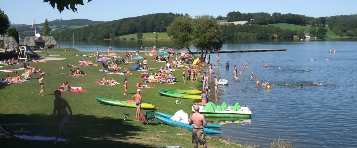 The Lac de Villefranche-de-Panat at Villefranche de Panat, Aveyron, France was created between 1949 and 1952 when the Alrance (river) was dammed as part of a large scheme to divert the waters of the Violou and Alrance to the Le Pouget (power station). The Lac de Pareloup discharges through this lake. The lake is also used for leisure. Plage municipale