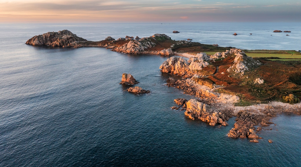 .Drone view of Primel Tregastel, ocean coast in France, Brittany at sunset.