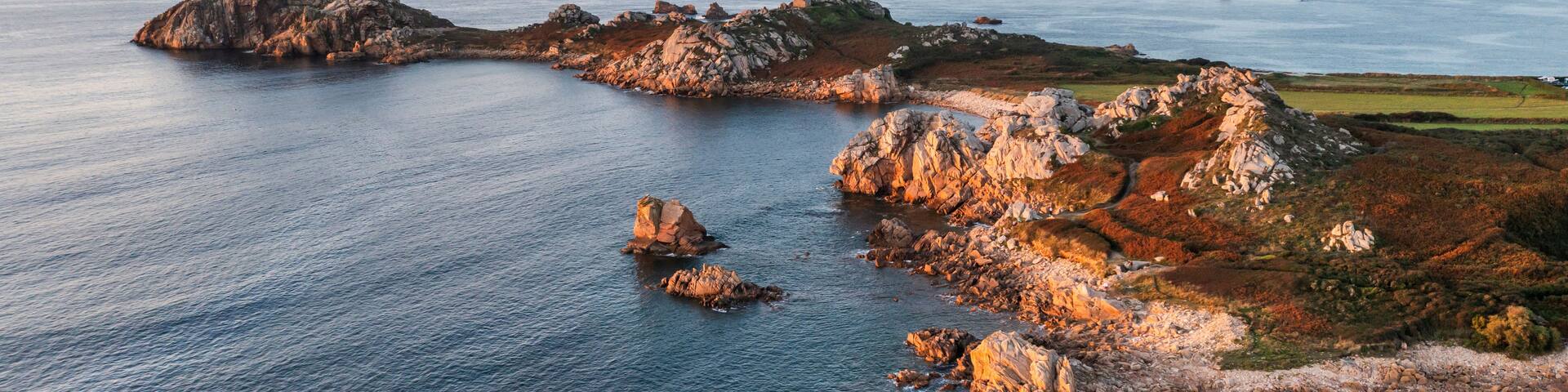 .Drone view of Primel Tregastel, ocean coast in France, Brittany at sunset.