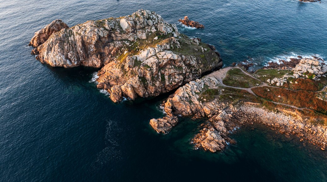 Drone view of Primel Tregastel, ocean coast in France, Brittany at sunset.