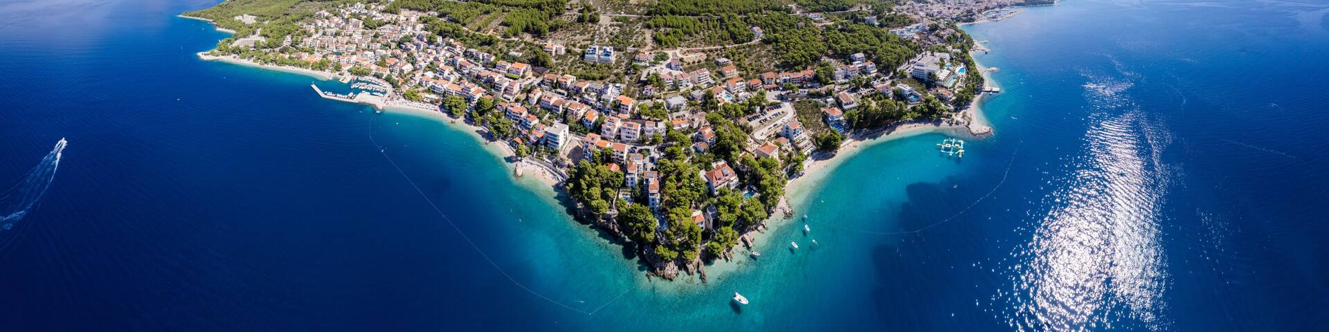 Famous Punta Rata beach with azure sea in Tucepi, Dalmatia, Croatia