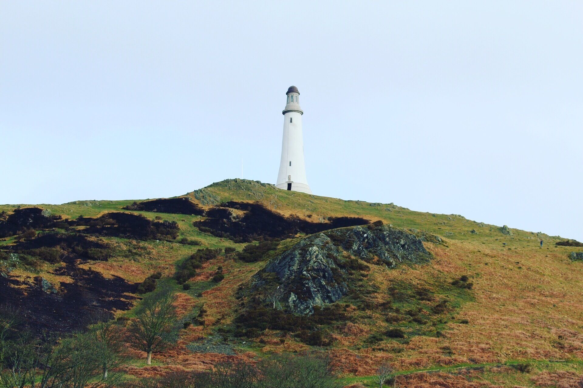 Lighthouse on top of a beautiful mountain in Cumbria 