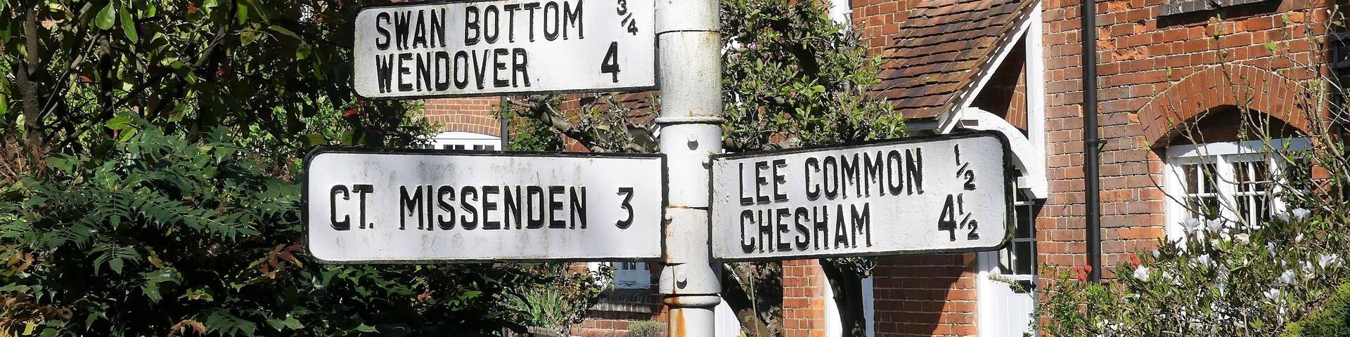 A directional signpost with multiple signs pointing to Swan Bottom, Wendover, Ct. Missenden, Lee Common, and Chesham.