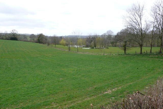 Ornamental garden at Sandpit Old Farm These ornamental gardens consisting of a series of water ponds just to the east of the farm have been constructed on what was presumably the old pits.