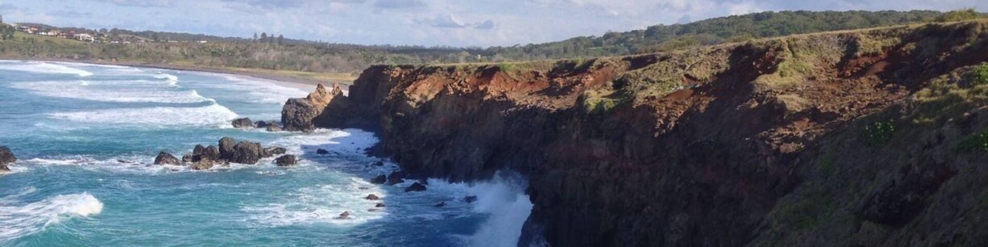 The cliffs of Pat Morton Lookout, Lennox Head, NSW. This is my favourite place in the Northern Rivers, as the sweeping meadow, high cliffs, pebbly beach and vast expanse of sea makes me feel I'm far away on an adventure.