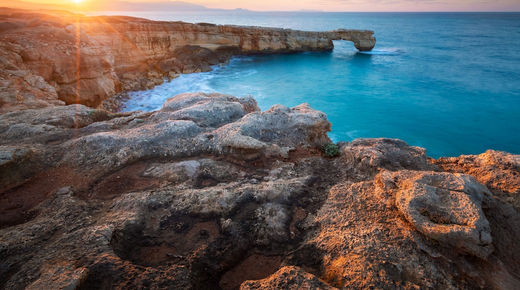 Limestone cliffs and a rock arch near Lavris village in Rethymno regio