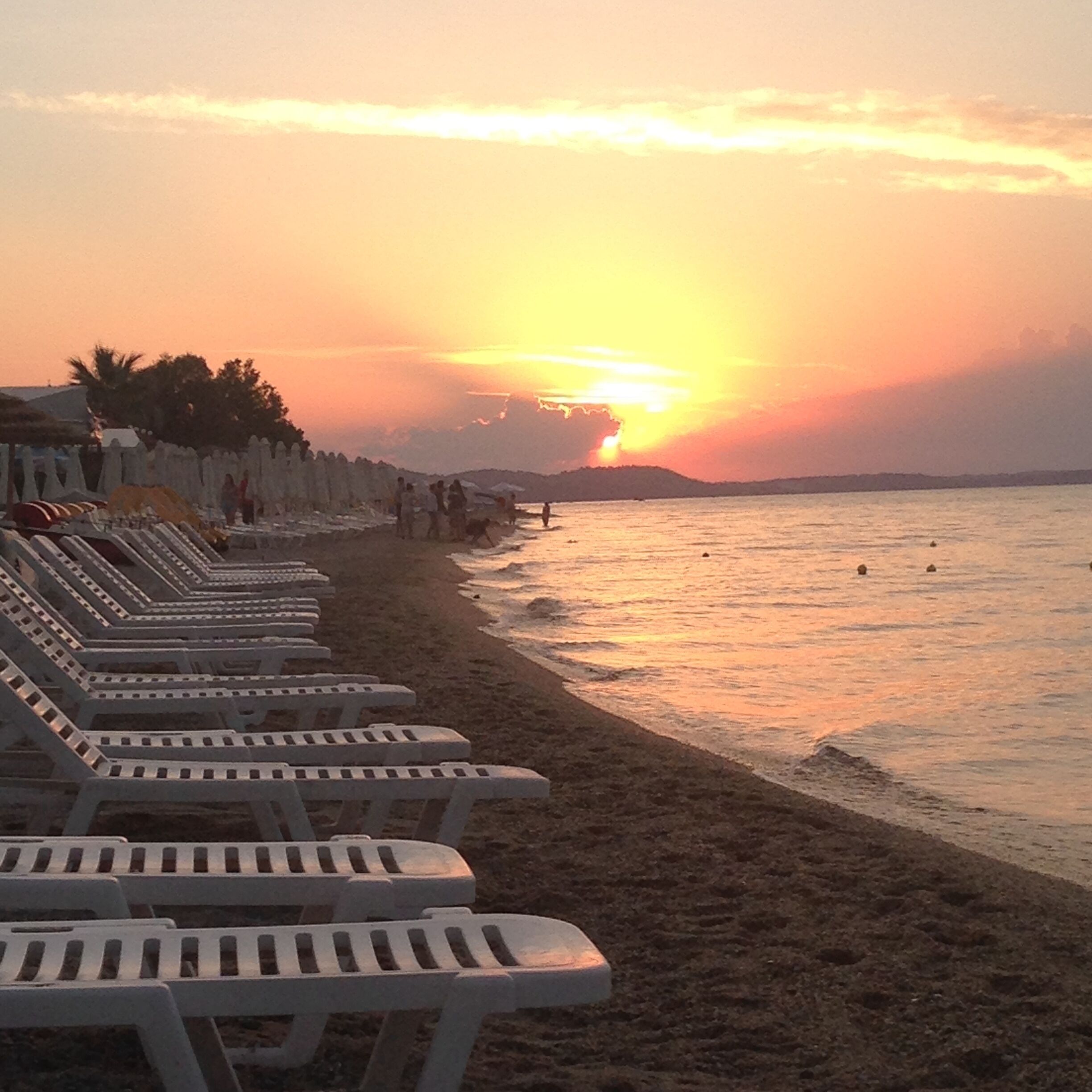 Sunsets were always gorgeous on the beach. We would watch it with a bottle of Mykonos beer and oregano potato chips. Heaven.