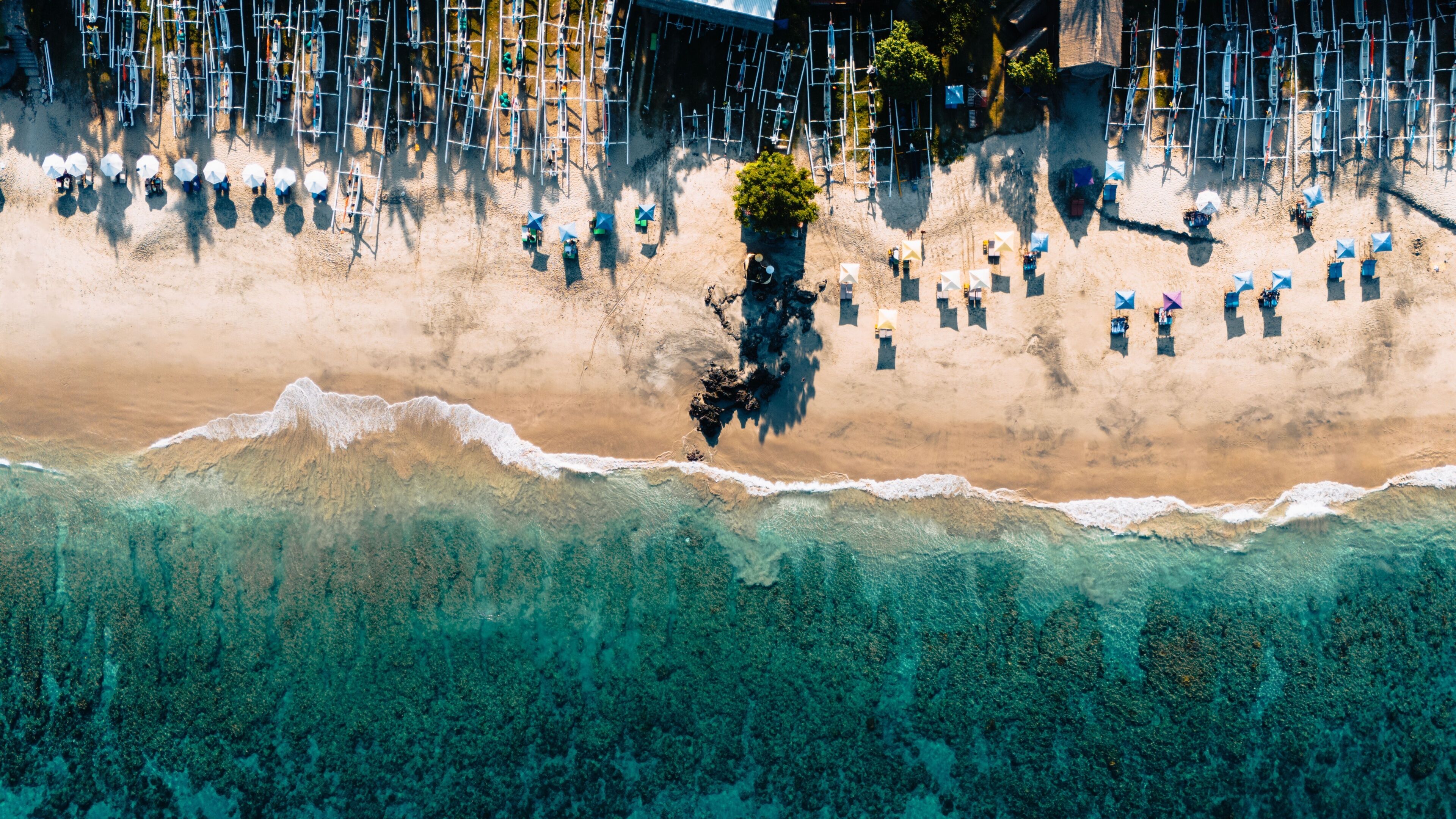 Aerial view of Virgin Beach in Karangasem, Bali on a sunny day