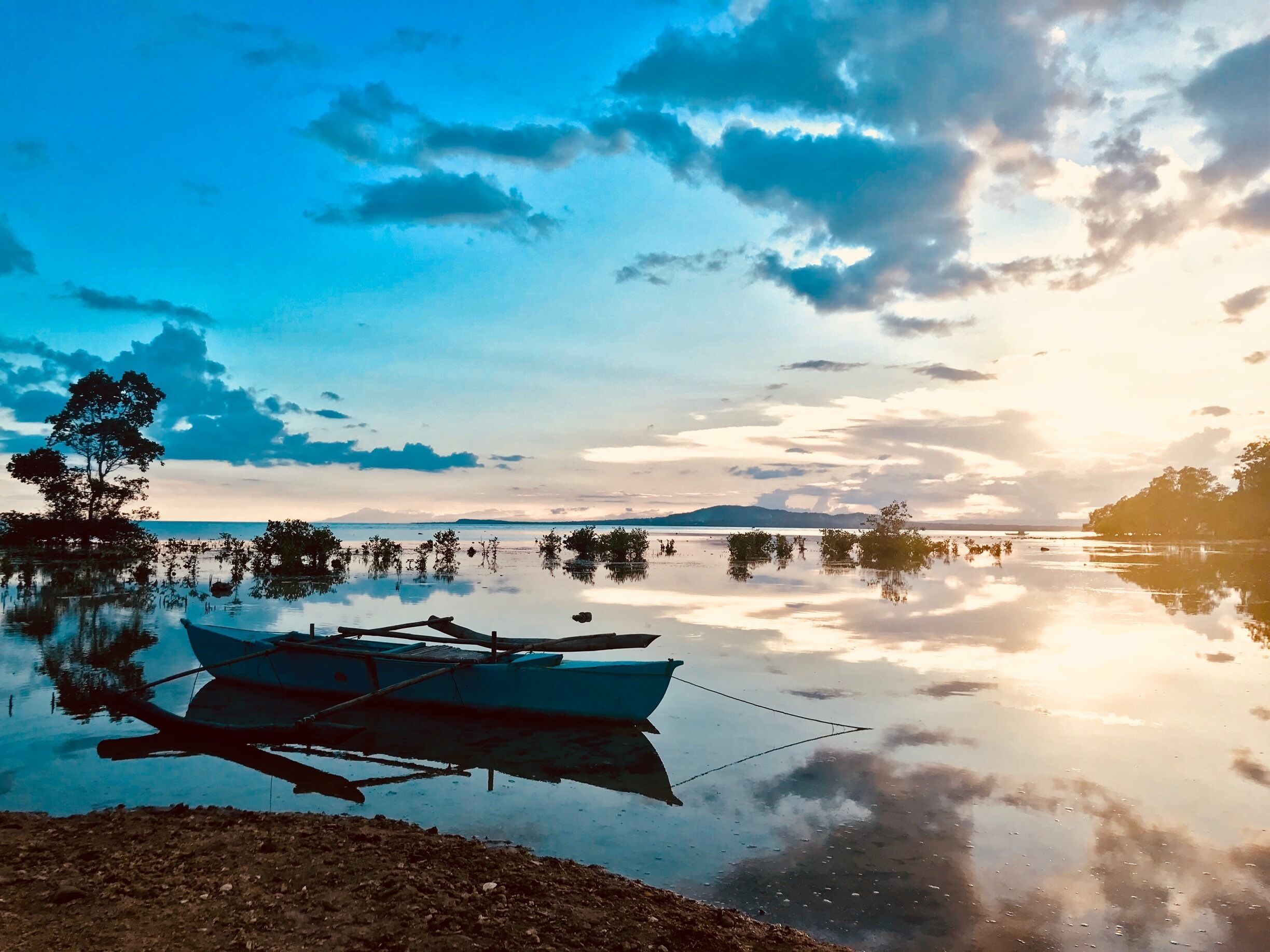 Just outside a phyton sanctuary in Bohol, Philippines. Really like the sunset effect on the beach here. 
