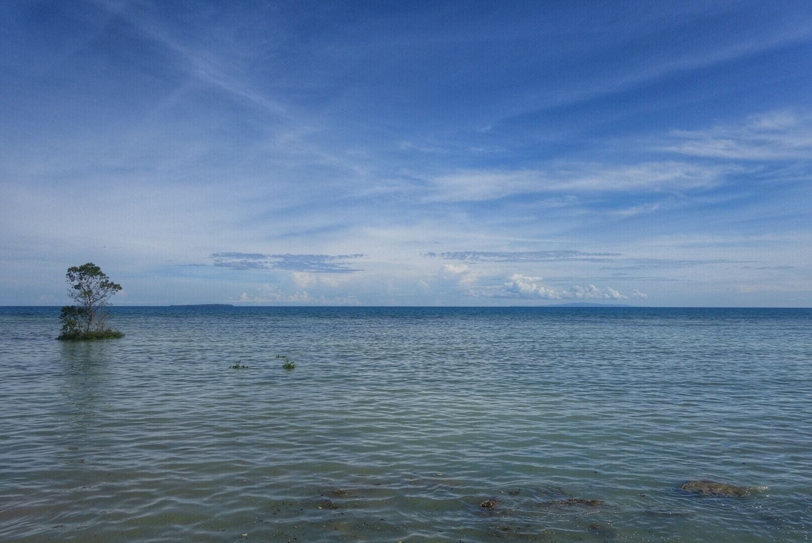 Just a minute drive from the church, I insisted my driver pull over. This one tiny little island, the calm water, the peaceful sky...it just looked perfect for a new background picture on my computer. #EndlessSummer