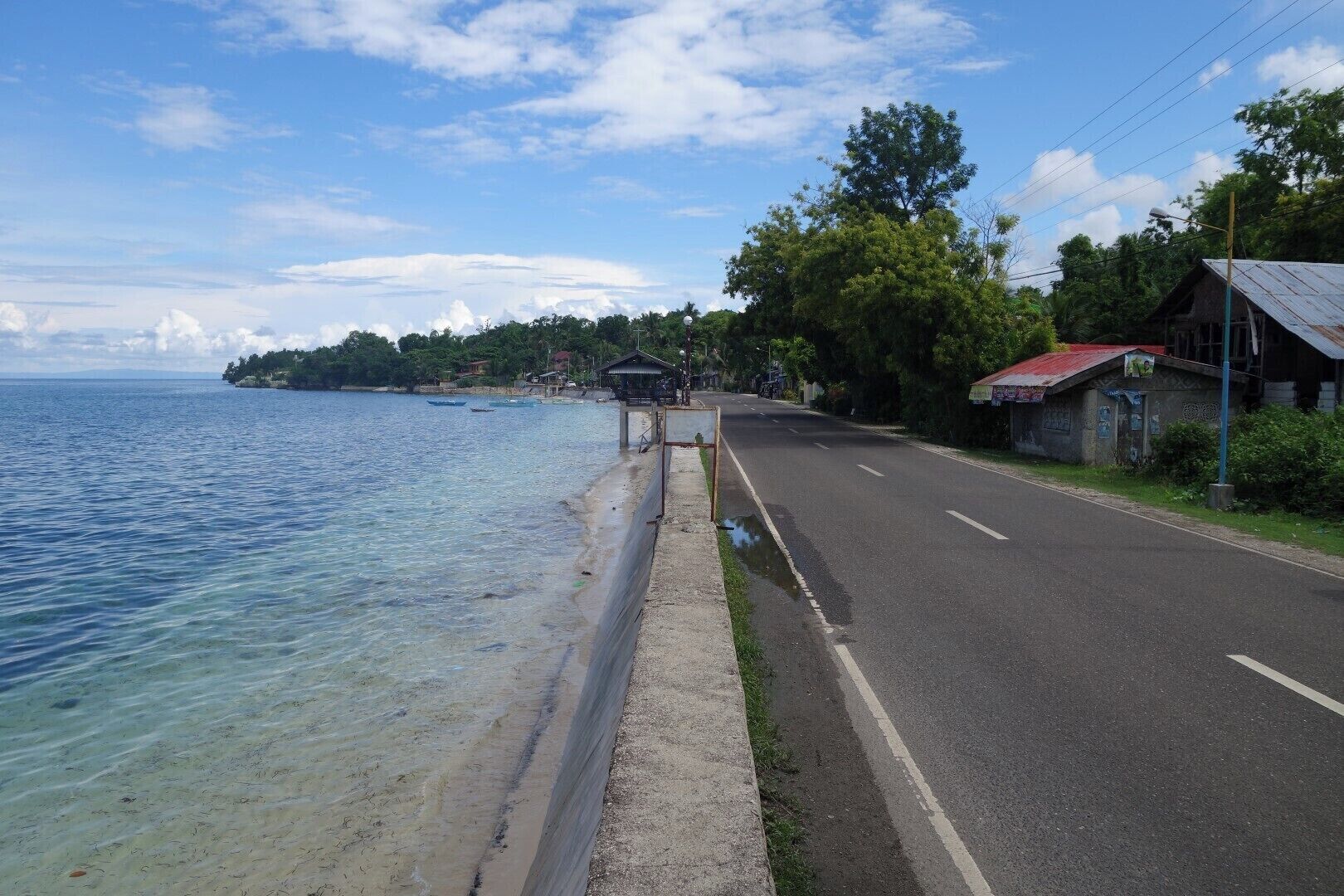 A minute from the church I insisted my driver pull over for a photo stop. Then I saw this. It's that thin line between beach life and relaxation vs the hustle and bustle of driving to work and dealing with traffic. I enjoy the beach side. #EndlessSummer
