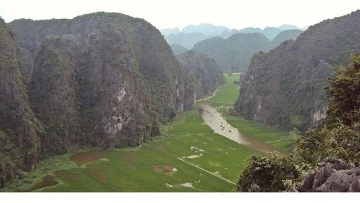 Taking a few yrs ago. A place where most people on there travels pass is Ninh Binh. The inland version of Halong Bay.A nice walk up to the top with a great view #desktop