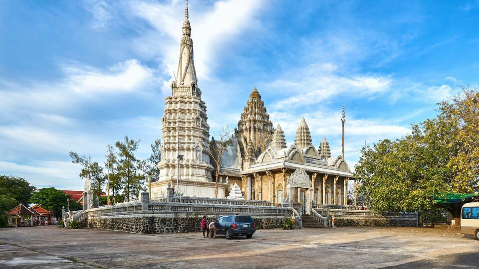 A large, ornate temple with multiple spires and intricate architecture.