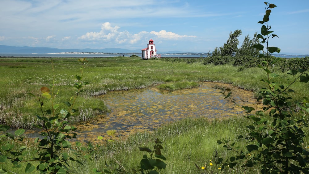 Lighthouse by the Saint Lawrence river in Saint André de Kamouraska, Quebec, Canada