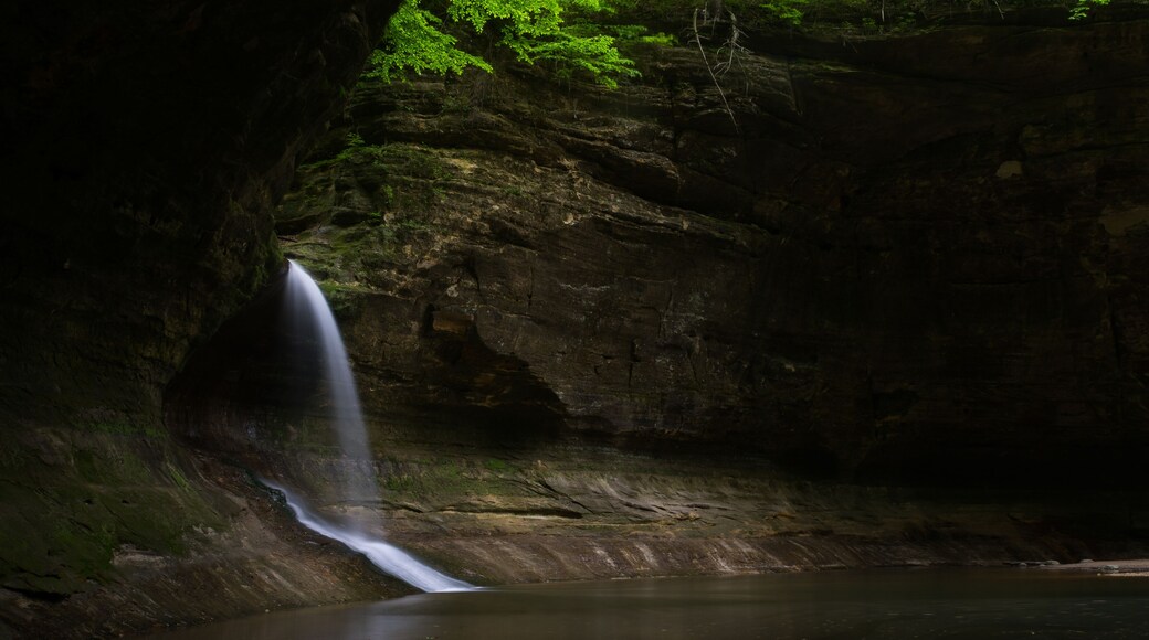Sunlight shining on Cascade Falls on a Spring morning. Matthiessen State Park, Illinois, USA