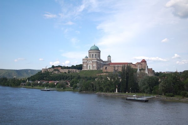 Esztergom is a pleasant Hungarian town situated on the Slovakia-Hungary border. Štúrovo is the town on the Slovak side of the border, which has an ethnic Hungarian majority.
On a small hill overlooking the town and the Danube is a Cathedral, which is the largest in Hungary, and the site at which the Hungarian king Vajk (Szent István) was baptised. The adjacent castle complex is also worth a look.
You can easily get here by bus or train from Budapest. Alternatively, you can take a train to Štúrovo which is on the main line between Budapest and Bratislava. From there, it's a 45 minute walk to the Danube.
