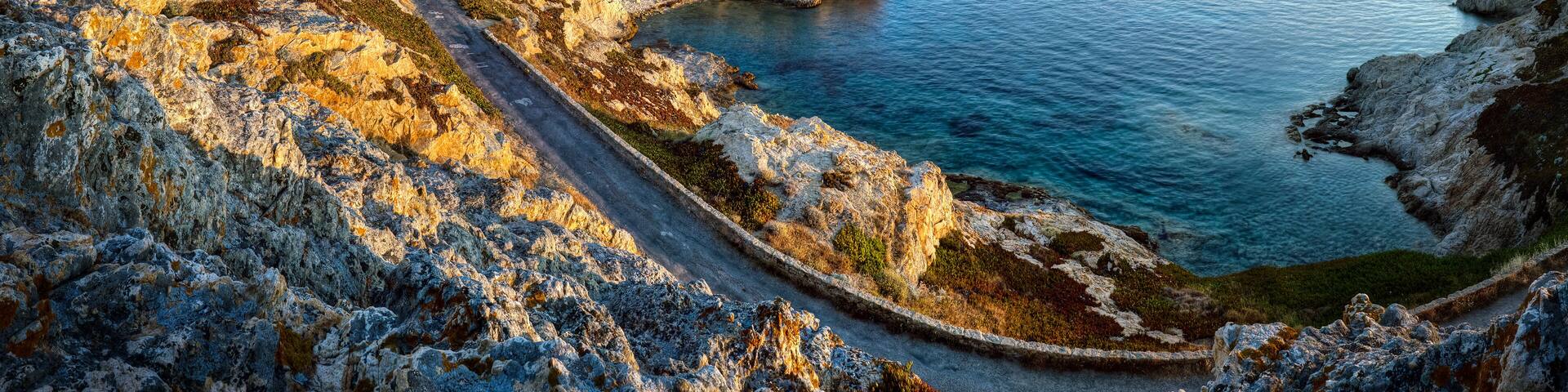 Panoramic view of sunrise on Isula Rossa (L'??le-Rousse) on the island Corsica.; Shutterstock ID 112193792; purchase_order: SP-1332 HA Batch 2 August 2018; Order: ; client: HomeAway; other: To be paid