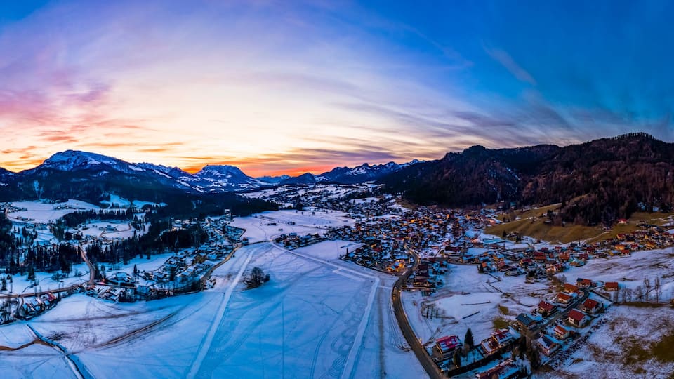 Aerial view, Snowy Reit im Winkl at dusk, Chiemgau, Upper Bavaria, Bavaria, Germany