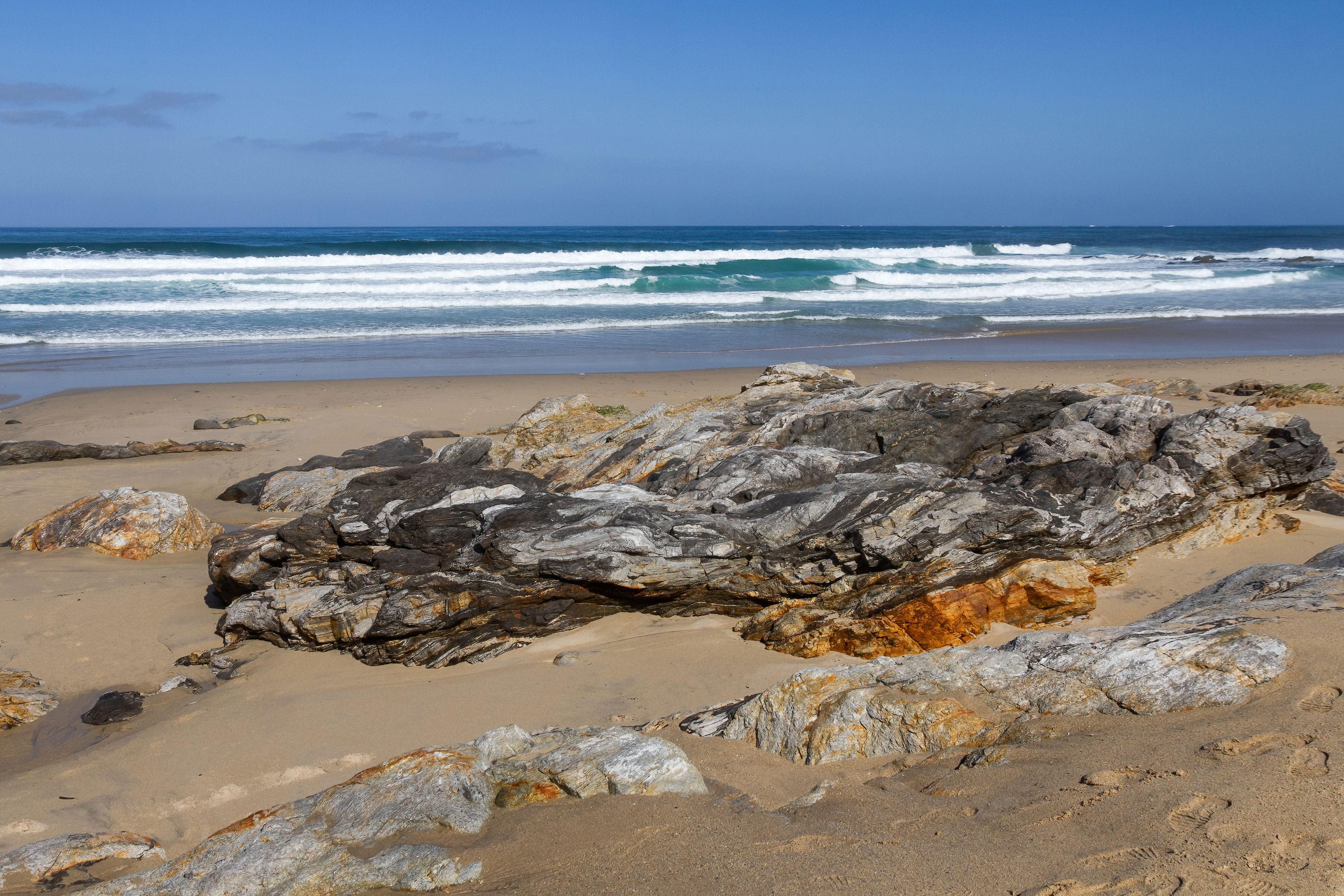 Waves reaching an empty beach with rocks. Razo Beach, Carballo