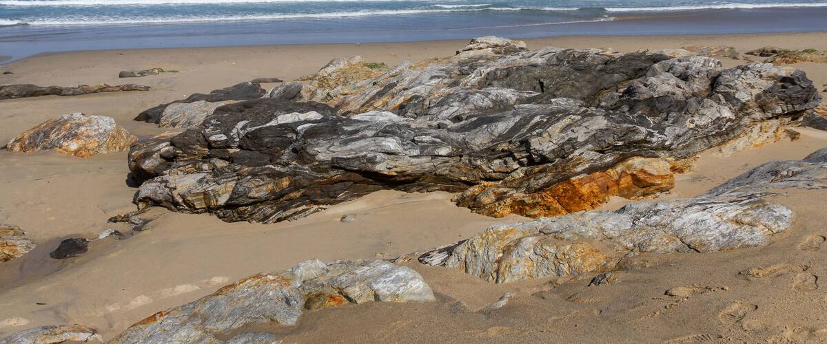 Waves reaching an empty beach with rocks. Razo Beach, Carballo