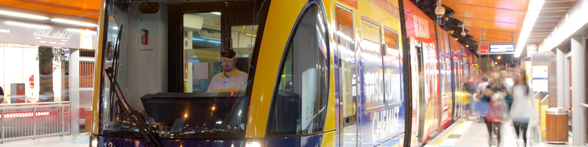 Cavill Avenue showing railway items and night scenes
